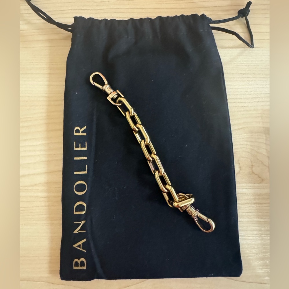 Bandolier Astrid gold wristlet